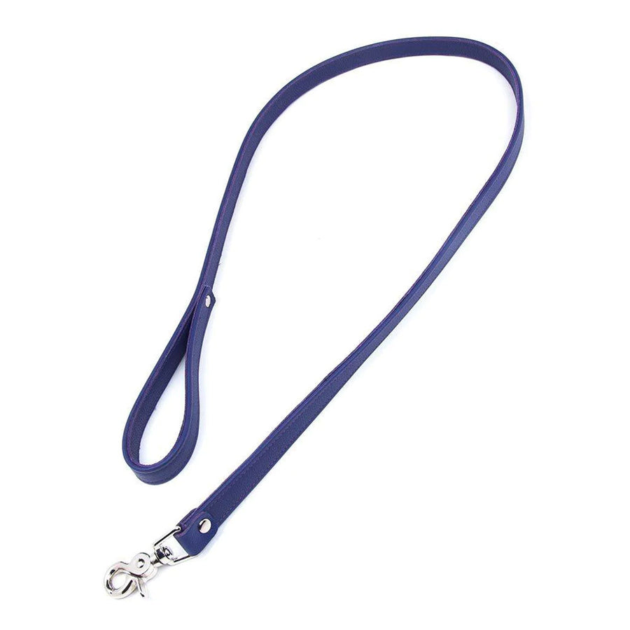 The purple Premium Garment Leather Leash is shown against a blank background. It is a strip of purple leather with a wrist loop on one end and a metal snap hook on the other.