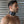 Load image into Gallery viewer, A close-up of a brunette man with facial hair is shown in profile. He wears the BDSM Alpha Dog Leather Collar with Spikes. The collar is wide and has a metal D-ring in the center and spikes covering it. It is padlocked in the back.
