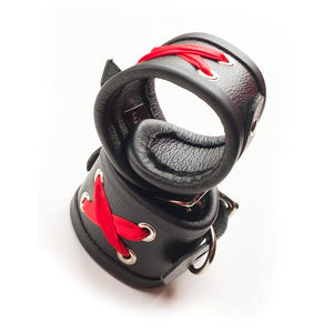 The Red Laced Leather Wrist Cuffs are shown stacked on top of each other against a blank background.