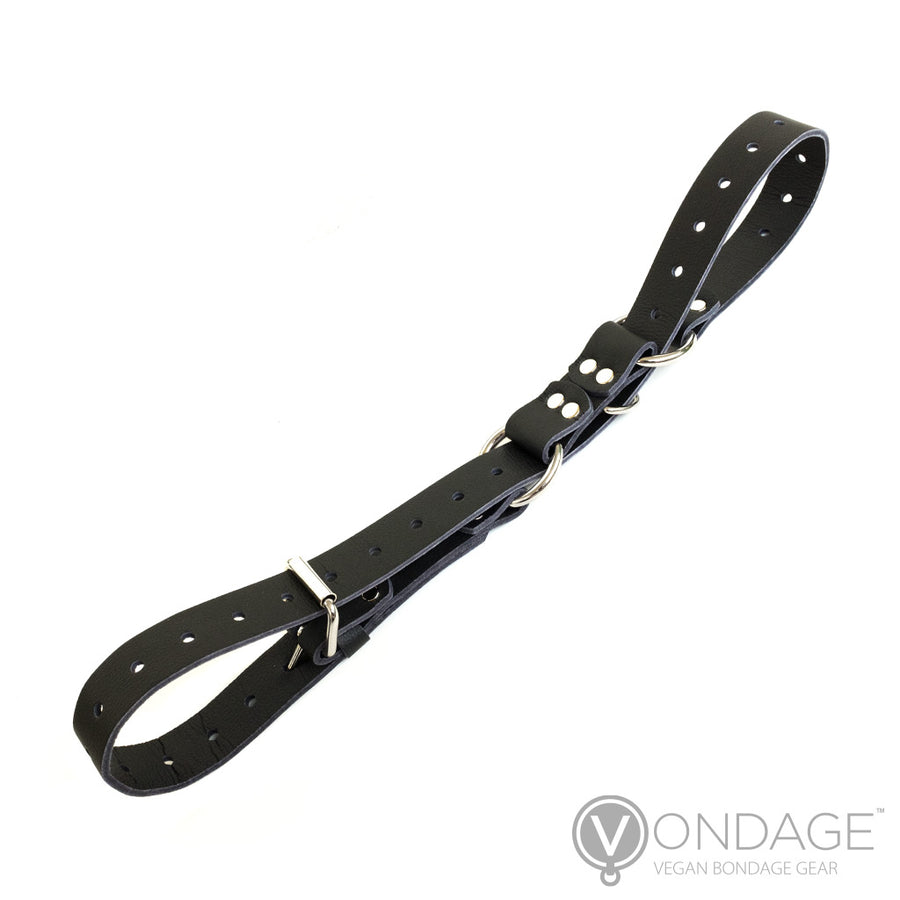 The Vondage Hobble Belt Bondage Device is shown against a blank background. It is made of black vegan leather with metal hardware.