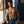 Load image into Gallery viewer, A shirtless man in blue jeans is shown wearing the Vondage Mercenary Suspenders. The suspenders are made of black vegan leather straps with silver hardware. The straps have rivets running down them and a snap hook on the bottom. 
