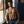 Load image into Gallery viewer, A shirtless man in blue jeans is shown wearing the Vondage Mercenary Suspenders. The suspenders are made of black vegan leather straps with silver hardware. The straps have rivets running down them and a snap hook on the bottom. 
