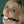 Load image into Gallery viewer,  A close-up of a blonde woman wearing the Kinklab Jawbreaker Gag with a Black strap is shown. She looks upwards at the camera.
