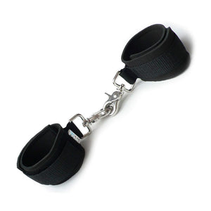 The Kinklab Neoprene Bondage Cuffs are displayed against a blank background. They are made of black neoprene with velcro. Each cuff has a metal snap hook attached to it.