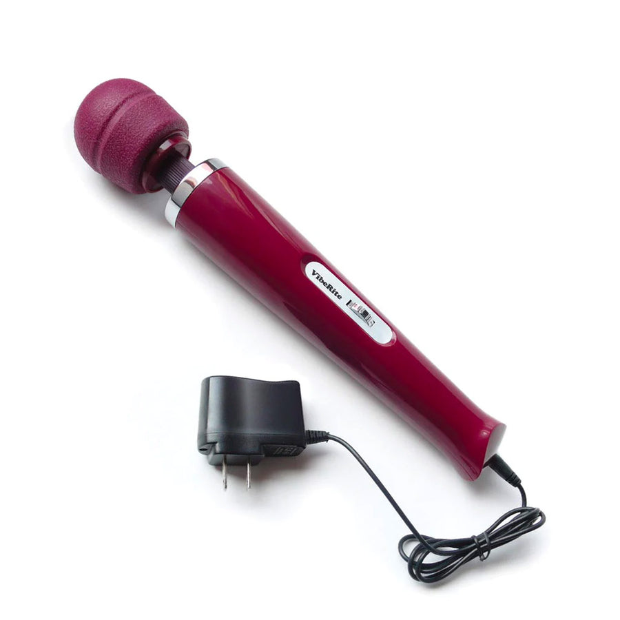 The Kinklab Viberite® Cordless 7 Speed Personal Wand Massager is displayed against a blank background with its charger plugged in. The charger shown is black and has a standard US outlet plug.