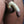 Load image into Gallery viewer, A close-up of a penis is shown with the shaft and top of the scrotum wrapped tightly in Clear Latex Bondage Strips.
