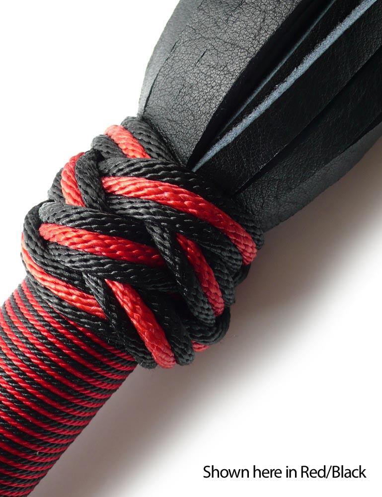 A close-up of the top of the red/black 30-inch Elk Hide Flogger handle is displayed against a blank background.