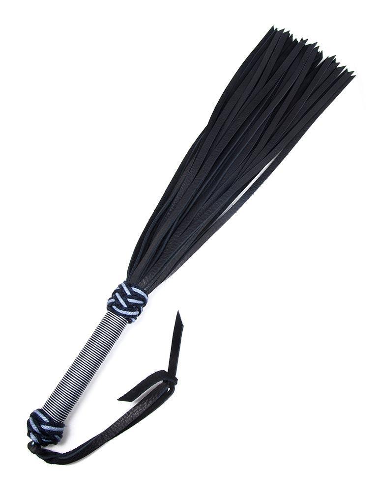 The silver/black 30-inch Buffalo Hide Flogger is displayed against a blank background. The flogger has black leather falls, and the handle is wrapped in silver and black nylon with knots at the top and bottom and a black leather wrist loop at the base of the handle.