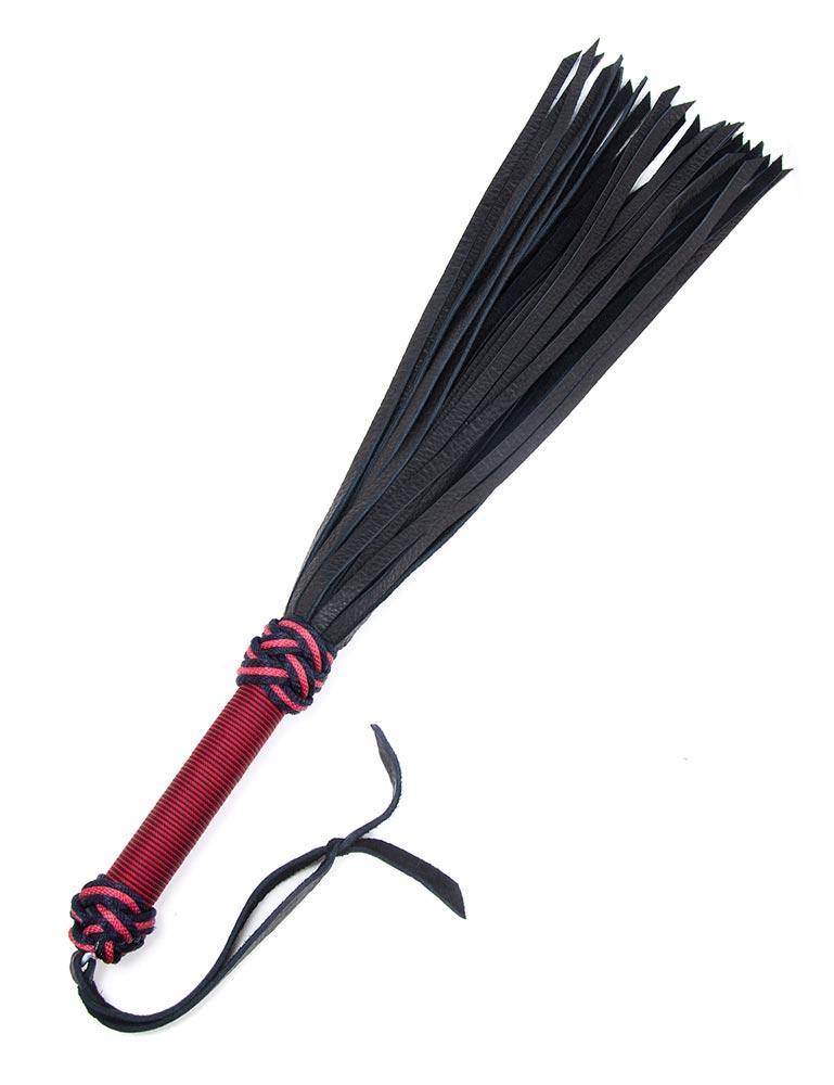 The red/black 30-inch Buffalo Hide Flogger is displayed against a blank background. The flogger has black leather falls, and the handle is wrapped in red and black nylon with knots at the top and bottom and a black leather wrist loop at the base of the handle.