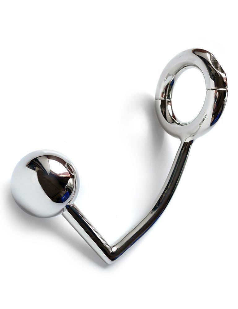 The silver stainless steel Trailer Hitch Jake Brake anal plug is displayed against a blank background. It is a hooked rod with a ball at one end and a thick ring at the other.