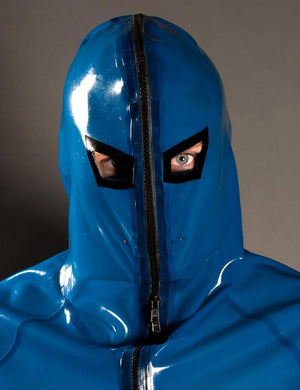 A close-up of a man's face is shown with the hood from the Executioner Hood by Syren Latex in transparent blue pulled up. The hood is completely zipped around his head and face and has eye hole cutouts. 