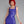 Load image into Gallery viewer, A woman with bright red hair poses in front of a grey background, wearing the Latex Tank Dress by Syren Latex in purple. The dress has tank top sleeves and is form-fitting, with the hem cutting off at her upper thigh.

